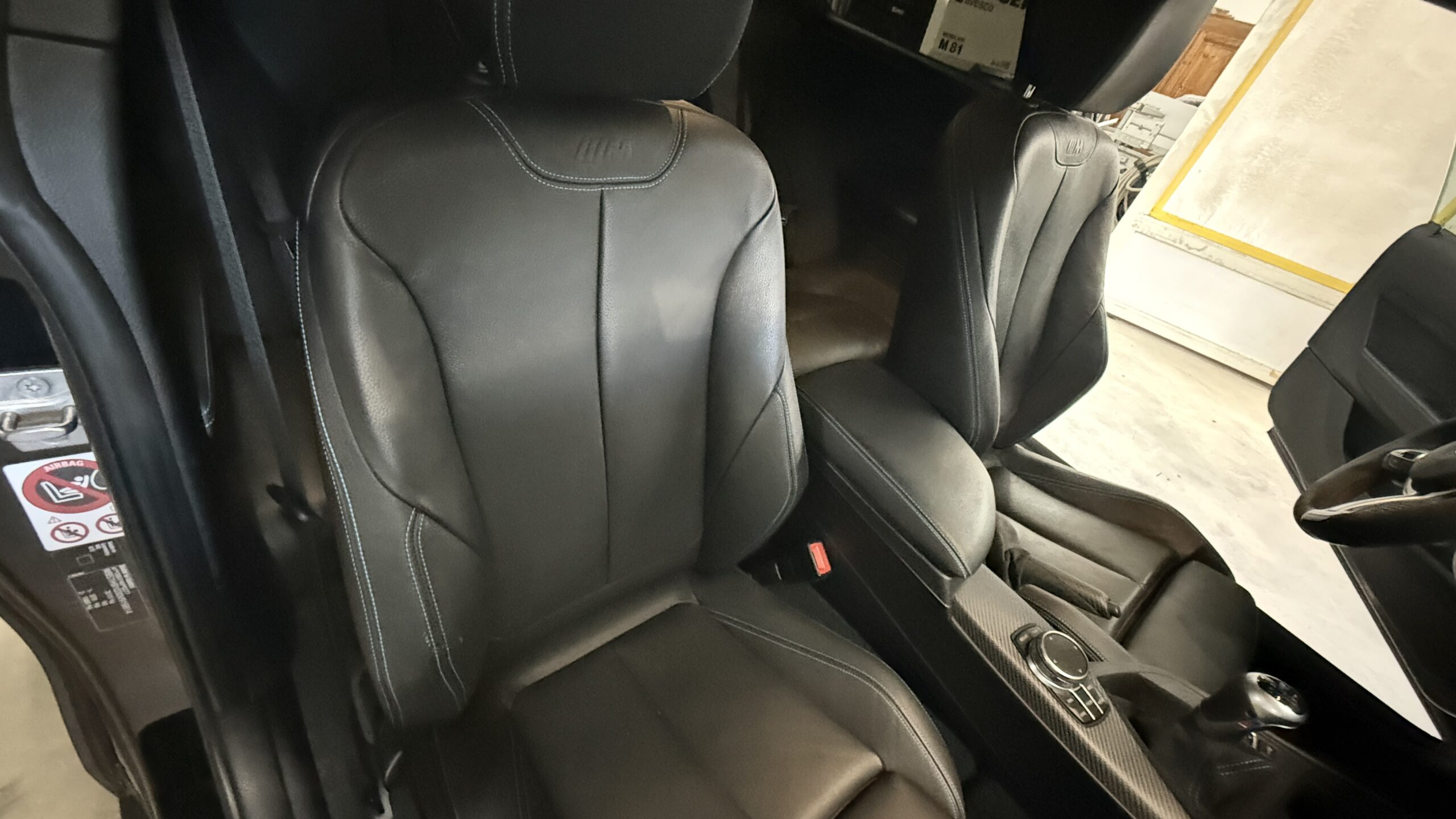 Sièges en cuir BMW après nettoyage cryogénique, cuir raviné et éclat retrouvé